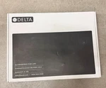 New Delta 39876LF-BL Nicoli Pull-down Bridge Kitchen Faucet Matte Black. Fixed Price $579.00.