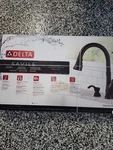 Delta Savile Venetian Bronze Single Handle Deck-mount Pull-down Kitchen Faucet. Fixed Price $150.00.