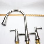 Glacier Bay Kitchen Faucet W/ Soap Dispenser Stainless Steel 2-HANDLE 1009101791. Fixed Price $91.73.
