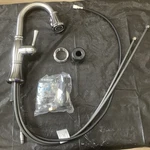 Delta Bar/prep Faucet Pull-down Single Hole Artic Stailnless 9997-AR-DST. Fixed Price $150.00.