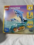Lego Creator 3-IN-1 Beautiful Dolphins 31385 Building Kit (542 Pieces) Brand New. Fixed Price $49.99.