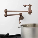 Signature Hardware Vivan Retractable Wall-mount Pot Filler Faucet Bronze. Fixed Price $199.99.