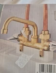 Glacier Bay Laundry Faucet Brass Two-handle New In Box. Fixed Price $30.00.