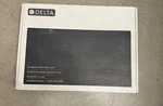 New Delta 39876LF-SS Nicoli Pull-down Bridge Kitchen Faucet Stainless. Fixed Price $559.00.