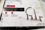 Delta Foundations 2-HANDLE Standard Kitchen Faucet W/ Side Sprayer Stainless New. Fixed Price $52.47.