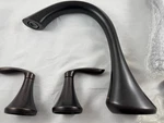 Moen Eva T944ORB Two-handle Roman Tub Faucet W/hand Shower Oil Rubbed Bronze. Fixed Price $385.00.