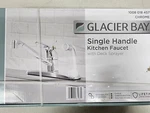 Single-handle Standard Kitchen Faucet Polished Chrome With White Deck Sprayer. Fixed Price $34.94.