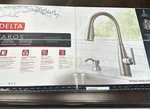Delta Varos Single Handle Pull-down Kitchen Faucet With Soap Dispenser Silver. Fixed Price $169.99.