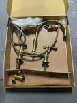 Kingston Brass/gold Widespread Deck Mount Kitchen Faucet 8IN High Arc W/ Sprayer. Fixed Price $150.00.
