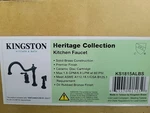 Kingston Brass Heritage Widespread Kitchen Faucet 3 Hole Sidespray - Bronze. Fixed Price $200.00.