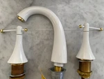 Kohler 310-4-PW Finial Widespread Lav Faucet Pol Brass/white High Arch Spout. Fixed Price $485.00.