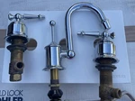 Kohler 325-4D-CP Antique Curio Widespread Bathroom Sink Faucet Polished Chrome. Fixed Price $850.00.