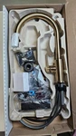 Delta 9159TLV-CZ-DST Trinsic Voice Touchless Pull Down Kitchen Faucet, Bronze. Fixed Price $680.00.
