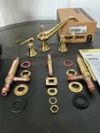 Kohler Revival T16119-4-PB Deck Mount Bath Faucet Polished Brass Scroll Handles. Fixed Price $450.00.