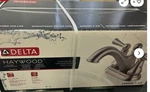 Delta 25999LF-SS Haywood Handle Centerset Bathroom Faucet Stainless Steel. Fixed Price $55.00.