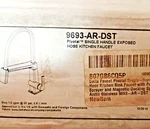 Delta 9693-AR-DST Pivotal Exposed Hose Kitchen Faucet Arctic Stainless. Fixed Price $510.00.