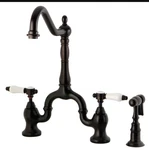 Kingston Brass KS7755BPLBS Bel-air Bridge Kitchen Faucet With Sprayer Orb. Fixed Price $200.00.