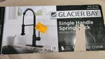 Glacier Bay 1 Handle Spring Neck Pull Down Sprayer Kitchen Faucet Matte Black. Fixed Price $78.90.