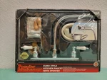 Popular Mechanics Double Handle Kitchen Faucet W/side Spray PM-FA7510 Euro Style. Fixed Price $47.99.