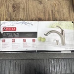 Delta Lewiston Stainless Single Handle Pull-out Kitchen Faucet & Soap Dispenser. Fixed Price $189.99.