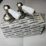Delta H212NP Set Of Small Lever Handles With Porcelain Accent. Fixed Price $19.94.