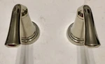 Set Of Two American Standard Polished Nickel Roman - Widespread Faucet Handles. Fixed Price $45.90.
