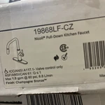 Delta Nicoli 19868LF-CZ Pull Down Spray Kitchen Faucet Champagne Bronze. Fixed Price $250.00.