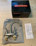 Vccucine Commercial Centerset Brushed Nickel 2 Handle Bathroom Faucet. Fixed Price $15.00.