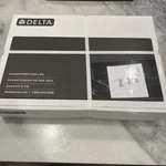 Sealed Delta Nicoli 35849LF Widespread Bathroom Faucet And Drain Polished Chrome. Fixed Price $104.99.