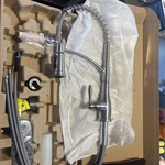 Glacier Bay Single Handle Spring Neck Kitchen Faucet With Soap Dispenser.. Fixed Price $100.00.
