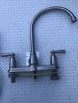 Moen High Arc Kitchen Faucet With Sprayer Model CA87060SRS, Brushed Nickel. Fixed Price $60.00.