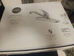 Project Source Chrome Kitchen Faucet W/ Side Spray, 4-HOLE 4IN Centerset Low Arc. Fixed Price $29.20.