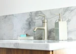 Kohler Purist K-14402-4A-BN Brushed Nickel Low Arc Single Hole Bathroom Faucet. Fixed Price $599.95.