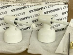 Delta H22BS Biscuit Small Lever Handle Bases Pair Genuine Nos - Warm White. Fixed Price $45.00.