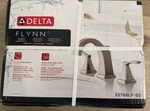 Delta Flynn Stainless Widespread 2-HANDLE Bathroom Faucet With Drain 35768LF-SS. Fixed Price $79.99.