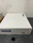 Kohler Purist Wall-mount Bridge Kitchen Faucet, 13-7/8" Spout, Matte Black. Fixed Price $1040.99.