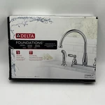 New Delta Foundations Kitchen Faucet With Side Sprayer Chrome Finish 21988LF. Fixed Price $42.90.