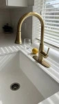 Delta Brushed Gold High Arc Single Handle Kitchen Faucet Modern Deck Mounted. Fixed Price $200.00.