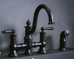 Moen S713WR Waterhill Two-handle Traditional Bridge Kitchen Faucet Sidespray. Fixed Price $750.00.