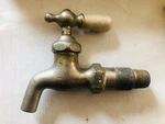 Antique Standard Wall Mount Water Faucet Nickel Plated With Hot Porcelain Handle. Fixed Price $18.00.