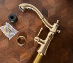 Delta 4197-CZ-DST Cassidy Pull-out Kitchen Faucet Champagne Bronze. Fixed Price $659.40.