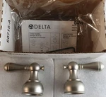 Delta H215NN Traditional Lever Handles In Pearl Nickel For 2-HANDLE Faucets. Fixed Price $88.99.