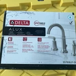 Delta Alux Two-handle Widespread Bathroom Faucet Model: 35769LF-SP #2B3. Fixed Price $90.00.