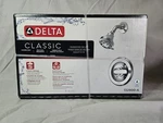 132900-A Sealed Delta Classic Shower Only 5 Spray Settings. Fixed Price $65.00.