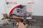 New Old Stock Delta Faucet Victorian Roman Deck Tub 2755 Chrome With Rough In. Fixed Price $200.00.