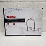 New Delta Foundations Kitchen Faucet With Side Sprayer Chrome Finish 21988LF. Fixed Price $45.77.