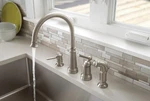New Moen Edison One-handle High Arc Kitchen Faucet 87042SRS W/ Sprayer Stainless. Fixed Price $105.00.