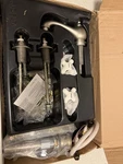 Delta 3577-NN Widespread Bath Faucet Pearl Nickel, Porcelain Cross Handles. Fixed Price $199.00.