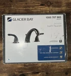 Glacier Bay Bronze Builders 8" Widespread High-arc Bathroom Faucet 1000707865. Fixed Price $69.99.