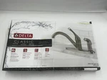 Delta Classic Single-handle Standard Kitchen Faucet W/ Side Sprayer Stainless. Fixed Price $115.50.